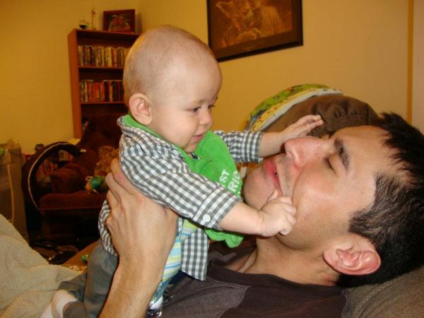 Cody pulling Dad's face